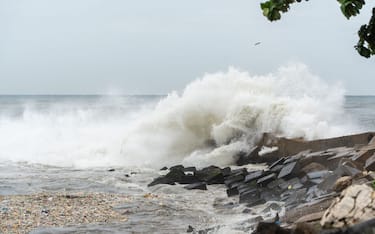 High tides are pictured at the malecon after Hurricane Beryl in Santo Domingo on July 2, 2024. Hurricane Beryl was hurtling towards Jamaica on July 2, as a monster Category 5 storm, after killing at least five people and causing widespread destruction in a deadly sweep across the southeastern Caribbean. (Photo by Francesco SPOTORNO / AFP) (Photo by FRANCESCO SPOTORNO/AFP via Getty Images)