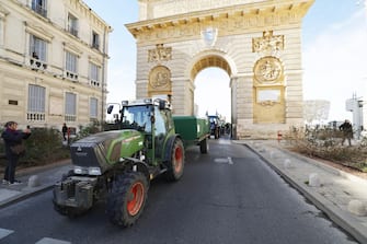 epa11105674 French farmers in tractors arrive to Montpellier to demonstrate in front of prefecture of Montpellier, France, 26 January 2024. French farmers continue their protests with road blockades and demonstrations in front of state buildings awaiting a response from the government to their request for  immediate  aid of several hundred million euros. On 23 January, the EU Agriculture and Fisheries Council highlighted the importance of providing the conditions necessary to enable EU farmers to ensure food security sustainably and profitably, as well as ensuring a fair income for farmers.  EPA/GUILLAUME HORCAJUELO
