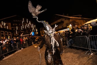 BOLZANO, ITALY - DECEMBER 07: Performers dressed as the Krampus creature parade through the city center of Dobbiaco on December 07, 2019 in Bolzano, Italy. (Photo by Simone Padovani/Awakening/Getty Images)