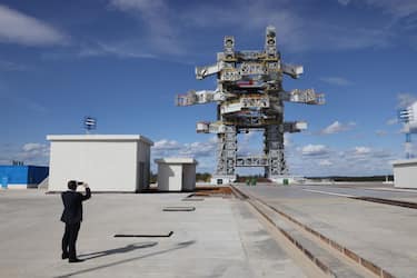 TSIOLKOVSKY, RUSSIA - SEPTEMBER 13: (RUSSIA OUT) A man takes a photo of a construction site of the Angara rocket launch complex on September 13, 2023 in Tsiolkovsky, Russia. North Korean leader Kim Jong-un is in Russia for talks with Russian President Putin. (Photo by Contributor/Getty Images)