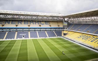 epa08306441 A greenkeeper mows the lawn of the Sukru Saracoglu Stadium in Istanbul, Turkey, 19 March 2020. Fenerbahce Istanbul will face Kayserispor in their Turkish Super League soccer match on 20 March 2020. Turkish health minister Fahrettin Koca on 18 March 2020 said that there are 191 confirmed cases of the pandemic COVID-19 disease caused by the SARS-CoV-2 coronavirus and two related death. Turkey decided to halt public events, temporarily shut down schools and suspend sporting events in an attempt to prevent further spreading of coronavirus.  EPA/ERDEM SAHIN