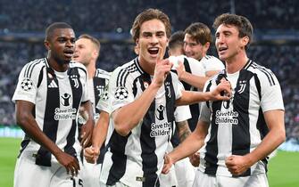 Juventus'  Kenan Yldiz jubilates after scoring the gol (1-0) during the Uefa Champions League soccer match Juventus  FC vs PSV Eindhoven at the Allianz Stadium in Turin, Italy, 17 September 2024 ANSA/ALESSANDRO DI MARCO