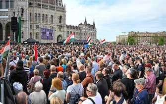 This panoramic photo shows protesters taking part in a rally organised by Hungarian opposition figure Peter Magyar, Hungarian lawyer, former government insider and ex-husband of former Justice Minister Varga, in downtown Budapest on April 6, 2024, to denounce the Hungarian government and corruption. (Photo by ATTILA KISBENEDEK / AFP)
