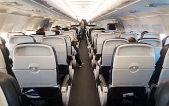 The aisle on a on a BA Airbus A321 plane / airplane / aeroplane / air plane during flight. (133)