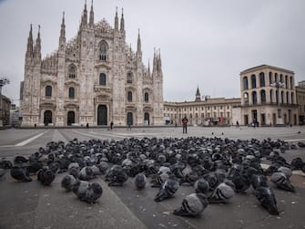 A view of the nearly-deserted Piazza del Duomo ('Cathedral Square') in the center of the Lombardian capital of Milan, northern Italy, 09 March 2020. The Italian authorities have taken the drastic measure of shutting off the entire northern Italian region of Lombardy   home to about 16 million people   in a bid to halt the ongoing coronavirus epidemic in the Mediterranean country. Ansa/Matteo Corner