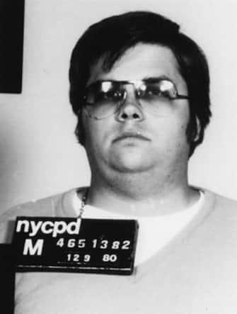 John Lennon's assassin Mark David Chapman poses for a mugshot on December 9, 1980 in New York . (Photo by Bureau of Prisons/Getty Images)  *** Local Caption *** Mark David Chapman