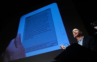 NEW YORK - FEBRUARY 09:  Amazon.com founder and CEO Jeffrey P. Bezos speaks at an event unveiling the new Amazon Kindle 2.0 at the Morgan Library & Museum February 9, 2009 in New York City. The updated electronic reading device is slimmer with new syncing technology and longer battery life and will begin shipping February 24th.  (Photo by Mario Tama/Getty Images)