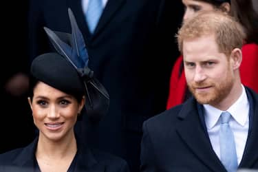KING'S LYNN, ENGLAND - DECEMBER 25: Meghan, Duchess of Sussex and Prince Harry, Duke of Sussex attend Christmas Day Church service at Church of St Mary Magdalene on the Sandringham estate on December 25, 2018 in King's Lynn, England. (Photo by Mark Cuthbert/UK Press via Getty Images)