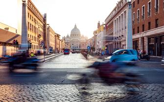 Beautiful sunset in Rome on old cobblestone streets
