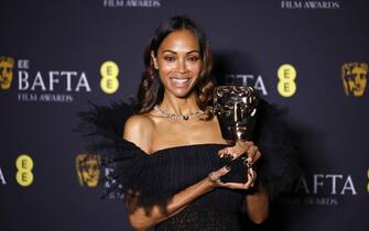 epa11901648 Zoe Saldana poses in the press room after winning the Best Supporting Actress award for 'Emilia Perez' during the BAFTA Film Awards at the Royal Festival Hall in London, Britain, 16 February 2025. The ceremony is hosted by the British Academy of Film and Television Arts (BAFTA).  EPA/TOLGA AKMEN