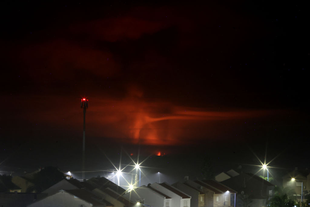 Fire and smoke billow over the Gaza Strip during an Israeli airstrike as seen from Sderot, near the southern Israeli border with Gaza, on December 4, 2023. Israel's army on December 4, 2023 sent dozens of tanks into southern Gaza as part of expanded action against Hamas despite global concern over mounting civilian deaths, and as communications was cut across the besieged territory. (Photo by GIL COHEN-MAGEN / AFP) (Photo by GIL COHEN-MAGEN/AFP via Getty Images)