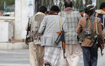 epa11091780 Houthi supporters attend a funeral killed Houthi fighters at a mosque in Sana'a, Yemen, 20 January 2024. The Houthis and the Yemeni government have committed to a set of measures to implement a nationwide ceasefire and engage in preparations for the resumption of an inclusive political process under UN auspices, UN special envoy for Yemen, Hans Grundberg, has announced. Yemen's war is referred to as the Saudi Arabia-Iran proxy war in which the warring parties have been militarily and politically backed by Saudi Arabia and Iran respectively.  EPA/YAHYA ARHAB