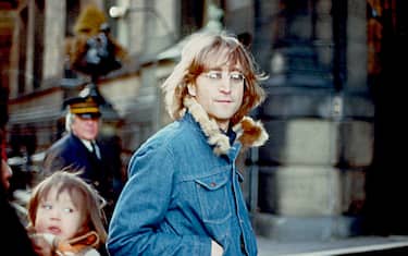 NEW YORK - 1977: Former Beatle John Lennon poses for a photo with his wife Yoko Ono and son Sean Lennon in 1977 in New York City, New York.  (Photo by Vinnie Zuffante/Getty Images)