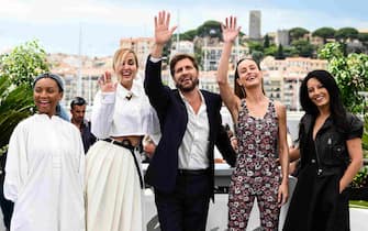 Swedish film director and President of the Jury of the 76th Cannes Film Festival Ruben Ostlund (C) poses with members of the jury (from L) Zambian film director Rungano Nyoni, French film director Julia Ducournau, US actress Brie Larson and Moroccan film director Maryam Touzani during a photocall for the 2023 Cannes film festival jury at the 76th edition of the Cannes Film Festival in Cannes, southern France, on May 16, 2023. (Photo by CHRISTOPHE SIMON / AFP) (Photo by CHRISTOPHE SIMON/AFP via Getty Images)