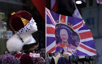 King Charles III and coronation merchandise on display in a shop window near to Windsor Castle in Windsor, Berkshire. Preparations are underway across the UK for the coronation on May 6. Picture date: Thursday April 13, 2023.