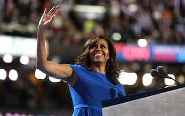 PHILADELPHIA, PA - JULY 25:  First lady Michelle Obama acknowledges the crowd after delivering remarks on the first day of the Democratic National Convention at the Wells Fargo Center, July 25, 2016 in Philadelphia, Pennsylvania. An estimated 50,000 people are expected in Philadelphia, including hundreds of protesters and members of the media. The four-day Democratic National Convention kicked off July 25.  (Photo by Joe Raedle/Getty Images)