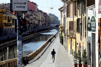 The Navigli district, the center of Milanese nightlife, dedserted due to the covid-19 coronavirus outbreak, Milan, Italy, 24 March 2020. Tighter lockdown measures come into force as Italy remains under lockdown. Countries around the world are taking increased measures to stem the widespread of the SARS-CoV-2 coronavirus which causes the Covid-19 disease. ANSA/Mourad Balti Touati