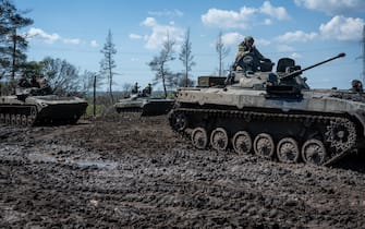 DONBAS REGION, UKRAINE - APRIL 26: Ukrainian armored vehicles maneuver and fire their 30mm guns, as Ukrainian Armed Forces brigades train for a critical and imminent spring counteroffensive against Russian troops, which invaded 14 months earlier, in the Donbas region, Ukraine, on April 26, 2023. Bolstered by billions of dollars worth of American and European military and economic support, Ukrainian forces are aiming to retake significant territory captured by Russia last year, as well as parts of Crimea and the eastern Donbas region, where Russian troops and local allies seized control in 2014. The counteroffensive is critical for Ukraine to show U.S. and Western donors that it can win on the battlefield and reverse Russian gains, and so deserves continued support. (Photo by Scott Peterson/Getty Images)