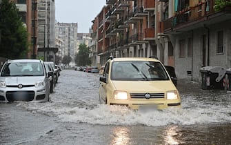 Alberi caduti e allagamenti causati dai forti temporali, Torino, 14 agosto 2024 ANSA/ALESSANDRO DI MARCO