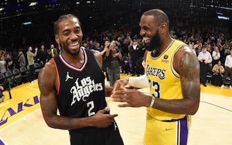 LOS ANGELES, CA - NOVEMBER 1: Kawhi Leonard #2 of the LA Clippers greets LeBron James #23 of the Los Angeles Lakers after the game on November 1, 2023 at Crypto.Com Arena in Los Angeles, California. NOTE TO USER: User expressly acknowledges and agrees that, by downloading and/or using this Photograph, user is consenting to the terms and conditions of the Getty Images License Agreement. Mandatory Copyright Notice: Copyright 2023 NBAE (Photo by Andrew D. Bernstein/NBAE via Getty Images) 
