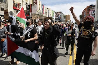 Los Angeles, CA - March 10: Protester demand an immediate and permanent ceasefire and an end to the blockade of Gaza and the occupation of Palestine in Oscar Rally and March in Hollywood on Sunday, March 10, 2024 in Los Angeles, CA. (Gina Ferazzi / Los Angeles Times via Getty Images)