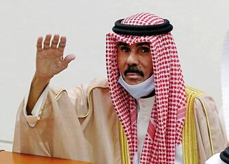 Emir of Kuwait Nawaf al-Ahmad al-Jaber al-Sabah waves as he arrives to attend the second session of the 16th legislative term, at the parliament in Kuwait City on October 26, 2021. (Photo by YASSER AL-ZAYYAT / AFP) (Photo by YASSER AL-ZAYYAT/AFP via Getty Images)