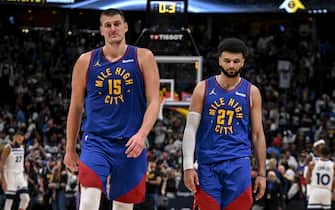 DENVER, CO - MAY 4: Nikola Jokic (15) and Jamal Murray (27) of the Denver Nuggets walk off the court after the fourth quarter of the Minnesota Timberwolves' 106-99 win at Ball Arena in Denver on Saturday, May 4, 2024. (Photo by AAron Ontiveroz/The Denver Post)