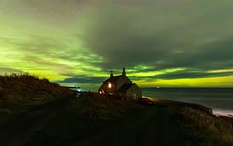 The Northern Lights appear over Howick Bathing House in Northumberland on Guy Fawkes NightWhere: Northumberland, United KingdomWhen: 05 Nov 2023Credit: John Fatkin/INSTARimages