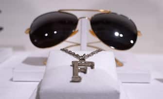 The sunglasses and necklace belonging to British singer-songwriter Freddie Mercury are displayed during the media preview for "Freddie Mercury: A World of His Own: The Evening Sale" at Sotheby's in New York City on June 1, 2023. More than 1,500 items from Mercury's private collection, including costumes and unique objects as well as the draft lyrics, will feature in the eventual auctions on September 6-8 in London and online August 4-September 11. The auction is expected to fetch at least Â£6 million ($7.5 million). (Photo by TIMOTHY A. CLARY / AFP) (Photo by TIMOTHY A. CLARY/AFP via Getty Images)