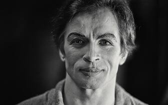 View of Russian-born ballet dancer and choreographer Rudolf Nureyev (1938 - 1993) in his dressing room, backstage at the Palais Garnier, Opera National de Paris, Paris, France, 1977. He was applying made up for an unspecified performance. (Photo by Derek Hudson/Getty Images)