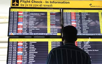 epaselect epa11978041 A display shows a cancelled flight to London amid a Heathrow Airport shutdown, in New Delhi, India, 21 March 2025. Heathrow Airport on 21 March announced it would be closed all day, following a power outage 'due to a fire at an electrical substation supplying the airport'.  EPA/RAJAT GUPTA