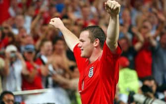 epa000217127 England's Wayne Rooney celebrates after scoring his second goal against Croatia during their Group B match as part of the European Soccer Championship at the Stadium of Light in Lisbon, Portugal, Monday 21 June 2004. Croatia and England play their third group match of the Euro2004, which will end on July 04.  EPA/GEORGI LICOVSKI +++ NO MOBILE APPLICATIONS +++