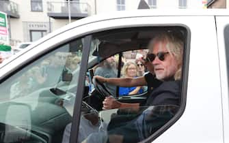 Bob Geldof rides in a taxi as part of the funeral cortege for Sinead O'Connor as the procession passes through her former hometown of Bray, Co Wicklow, ahead of a private burial service. Picture date: Tuesday August 8, 2023.
