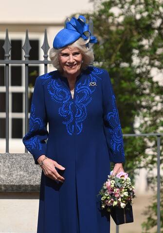 epa10566140 Britain's Camilla, the Queen Consort departs the Easter Sunday service at St Georges Chapel at Windsor Castle in Windsor, Britain, 09 April 2023.  EPA/NEIL HALL