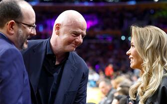 LOS ANGELES, CALIFORNIA - APRIL 09:  FIFA President Gianni Infantino talks with Jeanie Buss during a game between the Golden State Warriors and the Los Angeles Lakers at Crypto.com Arena on April 09, 2024 in Los Angeles, California.  NOTE TO USER: User expressly acknowledges and agrees that, by downloading and/or using this photograph, user is consenting to the terms and conditions of the Getty Images License Agreement.  (Photo by Ronald Martinez/Getty Images)