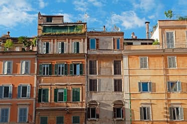 Colourful buildings in Piazza di Santa Maria, Trastevere, Rome, Italy.