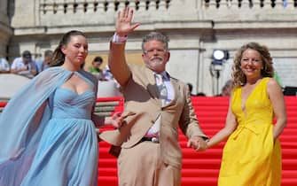 US filmmaker Christopher McQuarrie (C)  daughter Wilhelmina (L) and wife Heather (R) poses during a photocall for the movie 'Mission: Impossible - Dead reckoning Part 1' at Spanish Steps (Piazza di Spagna) in Rome, Italy, 19 June 2023. ANSA/ETTORE FERRARI