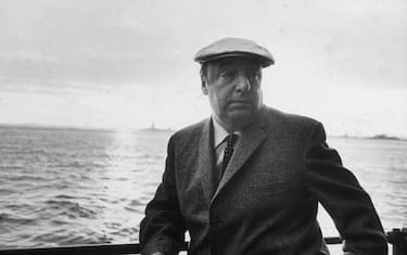 13th June 1966:  EXCLUSIVE Chilean poet and activist Pablo Neruda (1904 - 1973) leans on a ship's railing during the 34th annual PEN boat ride around New York City. He wears a cap.  (Photo by Sam Falk/New York Times Co./Getty Images)