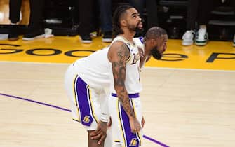LOS ANGELES, CA - MAY 20: LeBron James #6 and D'Angelo Russell #1 of the Los Angeles Lakers look on during the game against the Denver Nuggets during Game Three of the Western Conference Finals on May 20, 2023 at Crypto.Com Arena in Los Angeles, California. NOTE TO USER: User expressly acknowledges and agrees that, by downloading and/or using this Photograph, user is consenting to the terms and conditions of the Getty Images License Agreement. Mandatory Copyright Notice: Copyright 2023 NBAE (Photo by Adam Pantozzi/NBAE via Getty Images) 
