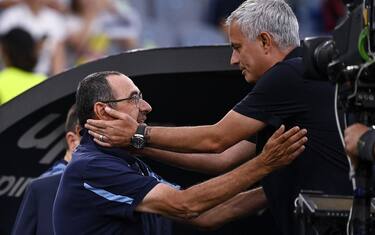RomaÕs head coach Jose Mourinho (R) with Lazio's head coach Maurizio Sarri (L) during the Serie A soccer match between SS Lazio and AS and Roma at the Olimpico stadium in Rome, Italy, 26 September 2021. ANSA/RICCARDO ANTIMIANI