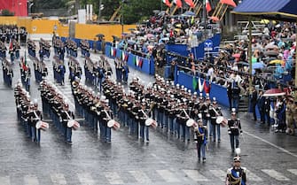 La Banda dell’Esercito Italiano diretta dal Maestro Direttore, maggiore Filippo Cangiamila, in occasione della Parata militare del 2 Giugno in via dei Fori Imperiali a Roma, 2 giugno 2024. ANSA/CLAUDIO PERI