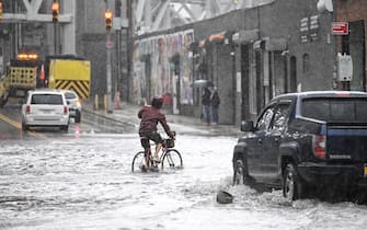 NEW YORK, UNITED STATES - SEPTEMBER 29: Cars struggle in a flooded street in Brooklyn, New York, United States on September 29, 2023. (Photo by Fatih Aktas/Anadolu Agency via Getty Images)