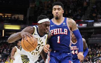 INDIANAPOLIS, INDIANA - JANUARY 25: Pascal Siakam #43 of the Indiana Pacers dribbles the ball while defended by KJ Martin #1of the Philadelphia 76ers during the second half of the game at Gainbridge Fieldhouse on January 25, 2024 in Indianapolis, Indiana.    NOTE TO USER: User expressly acknowledges and agrees that, by downloading and or using this photograph, User is consenting to the terms and conditions of the Getty Images License Agreement.  (Photo by Andy Lyons/Getty Images)