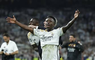 epa11328006 Vinicius Junior of Real Madrid celebrates after winning the UEFA Champions League semifinal second leg soccer match between Real Madrid and Bayern Munich, in Madrid, Spain, 08 May 2024.  EPA/JUANJO MARTIN