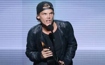 performs/speaks onstage at the 2013 American Music Awards held at Nokia Theatre L.A. Live on November 24, 2013 in Los Angeles, California.