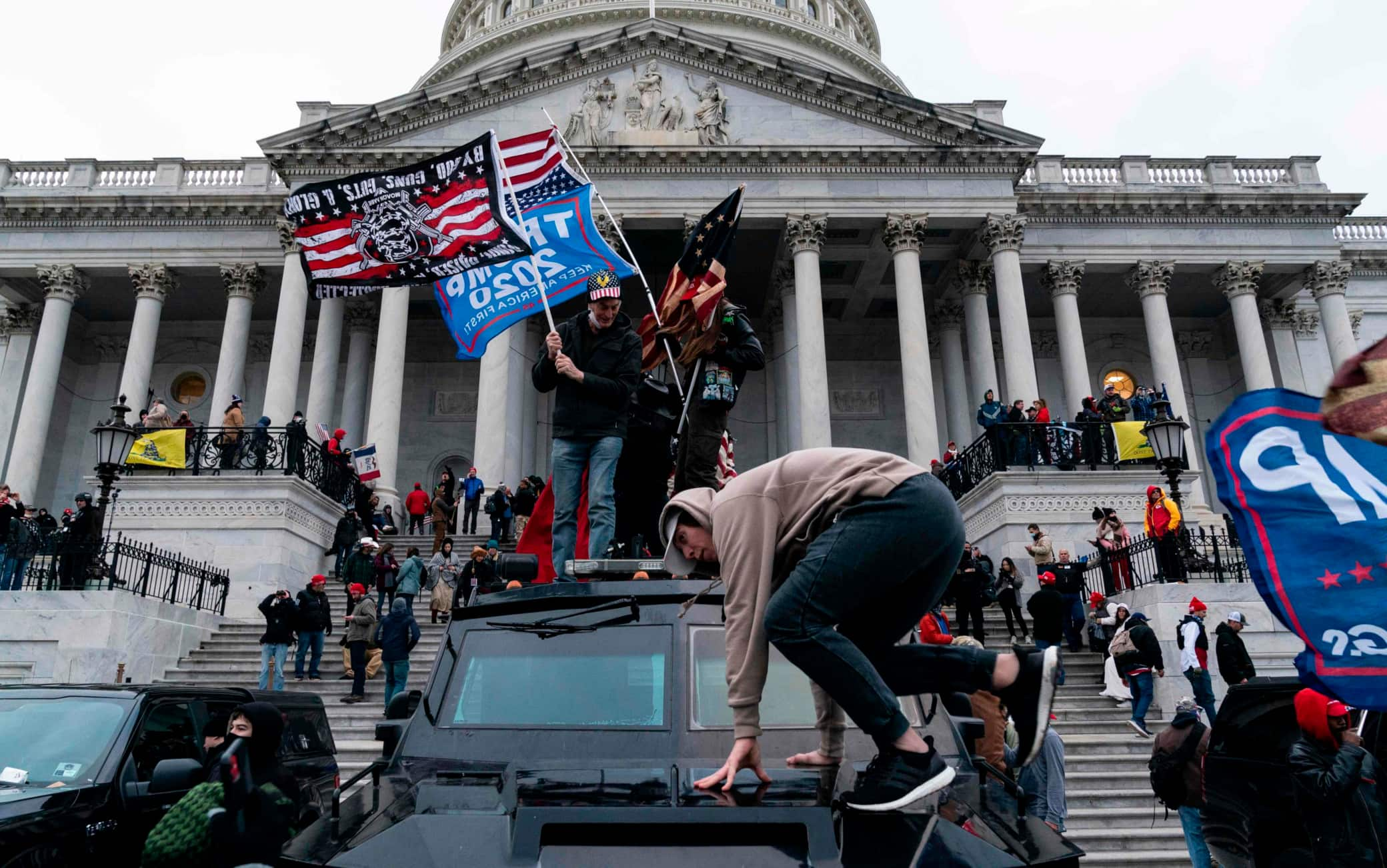 Supporters of US President Donald Trump protest outside the US Capitol on January 6, 2021, in Washington, DC. - Demonstrators breeched security and entered the Capitol as Congress debated the a 2020 presidential election Electoral Vote Certification. (Photo by ALEX EDELMAN / AFP)