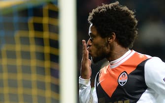 Shakhtar Donetsk's Luiz Adriano reacts after scoring his team's seventh goal during the UEFA Champions League group H football match between BATE Borisov and Shakhtar Donetsk at the Borisov Arena in Borisov on October 21, 2014. Shakhtar Donetsk won 7-0. AFP PHOTO / MAXIM MALINOVSKY        (Photo credit should read MAXIM MALINOVSKY/AFP/Getty Images)