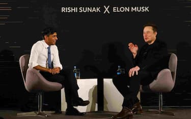 epa10955235 British Prime Minister Rishi Sunak (L) and tech entrepreneur Elon Musk (R) attend a conversation event in central London, Britain, 02 November 2023. The conversation will be streamed on X (formerly Twitter) and follows the two-day AI Safety Summit that was held at Bletchley Park.  EPA/TOLGA AKMEN / POOL