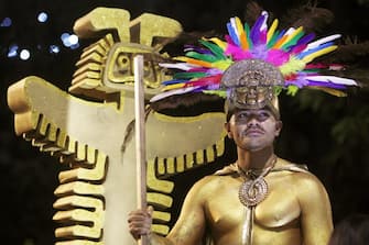 epa11018387 Artists participate in the traditional Parade of Myths, Legends, Carnivals and Ancestral Manifestations of Colombia, in Medellin, Colombia 08 December 2023. The parade highlights local legends like El Dorado, typical Colombian celebrations such as the Barranquilla Carnival, and recalls beliefs about ancient pre-Hispanic gods, in a colorful and cultural route that remembers and exalts the folklore and cosmogony of Colombia.  EPA/Luis Eduardo Noriega Arboleda