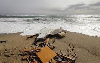 The remains of the boat carrying the migrants at a beach near Cutro, Crotone province, southern Italy, 26 February 2023. Italian authorities recovered at least 40 bodies on the beach and in the sea near Crotone, in the southern Italian region of Calabria, after a boat carrying migrants sank in rough seas near the coast. About forty people survived the accident, Authorities fear the death toll will climb as rescuers look for survivors.
ANSA/ GIUSEPPE PIPITA